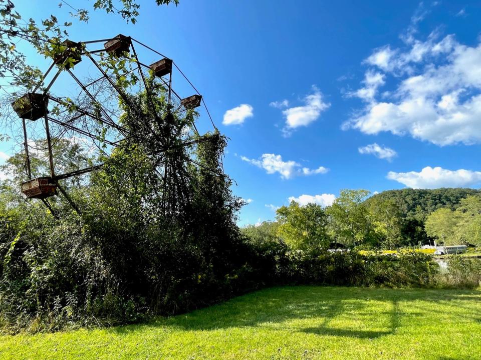 A rusty Ferris wheel is one of the picturesque relics dotting the former Lake Shawnee amusement park.