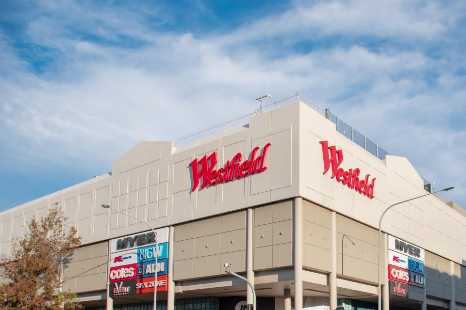 Westfield logo and exterior with blue sky behind