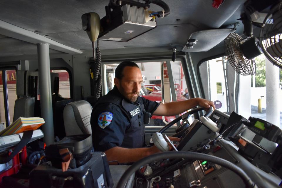 Bald Head Island public safety officer Chip Sudderth drives a fire engine on Wednesday, April 27, 2022.