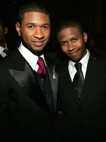 <p>KMazur/WireImage</p> Usher and brother James "J-Lack" Lackey during Royal Birthday Ball for Sean "P. Diddy" Combs in New York City.