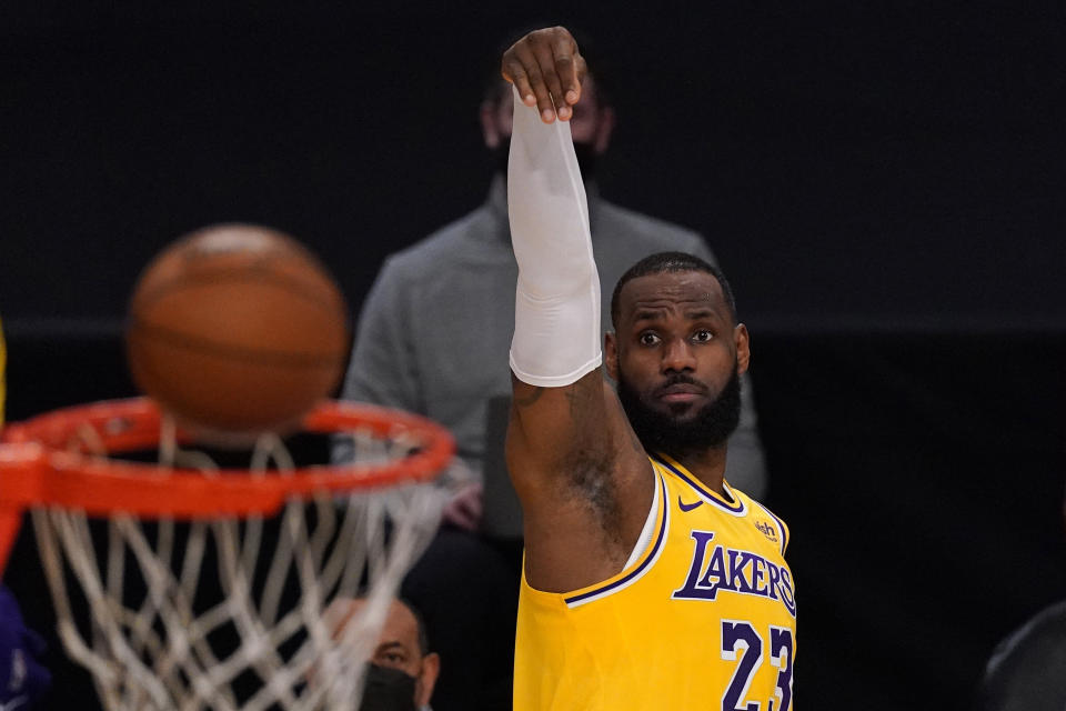 Los Angeles Lakers forward LeBron James shoots during the first half of an NBA basketball game against the Oklahoma City Thunder Monday, Feb. 8, 2021, in Los Angeles. (AP Photo/Mark J. Terrill)