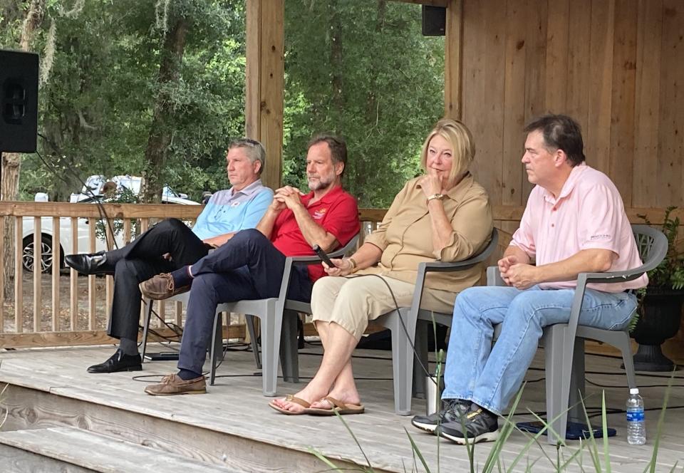 Candidates for the Volusia County chair's seat attend a candidate forum in DeLeon Springs on Thursday night. From left the candidates are Randy Dye, incumbent Jeff Brower, Deb Denys and Don Burnette.