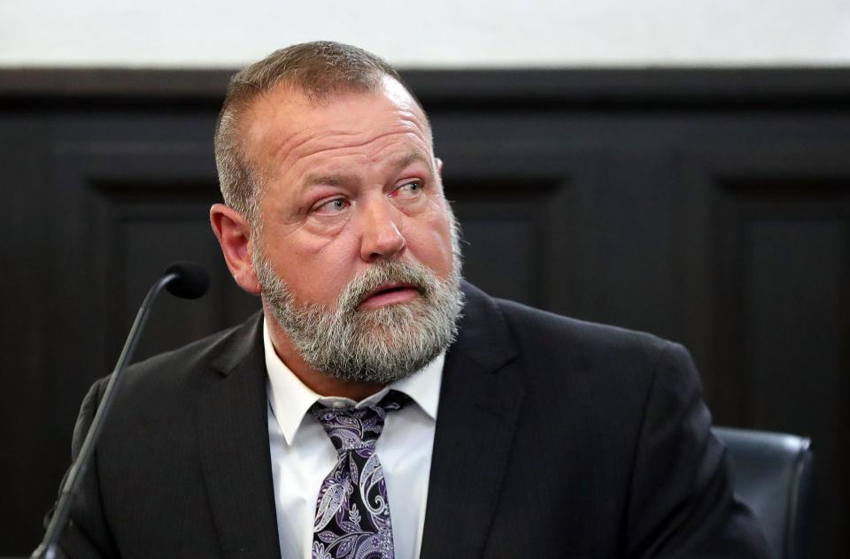 Mark Mickey gives a statement Thursday before being sentenced for arson in Judge Kathryn Michael's courtroom at the Summit County Courthouse in Akron.