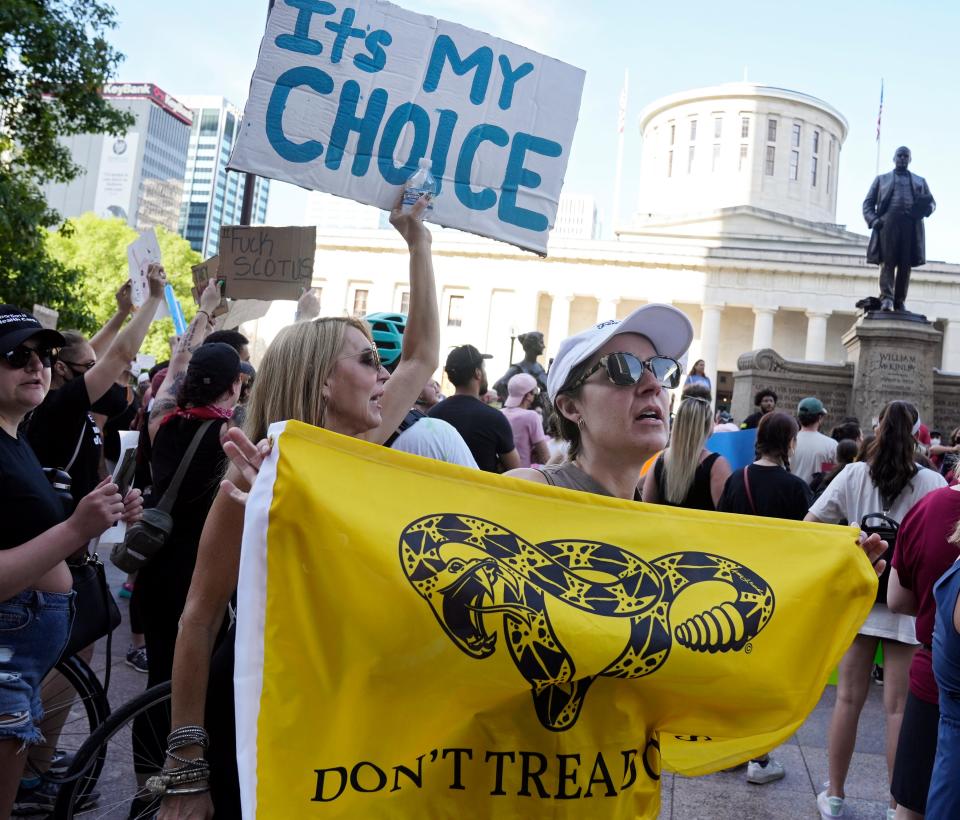 June 24, 2022; Columbus, Ohio, United States;  Hundreds of people rallied at the Ohio Statehouse and marched through downtown Columbus in support of abortion after the Supreme Court overturned Roe vs. Wade on Friday. Mandatory Credit: Barbara J. Perenic/Columbus Dispatch