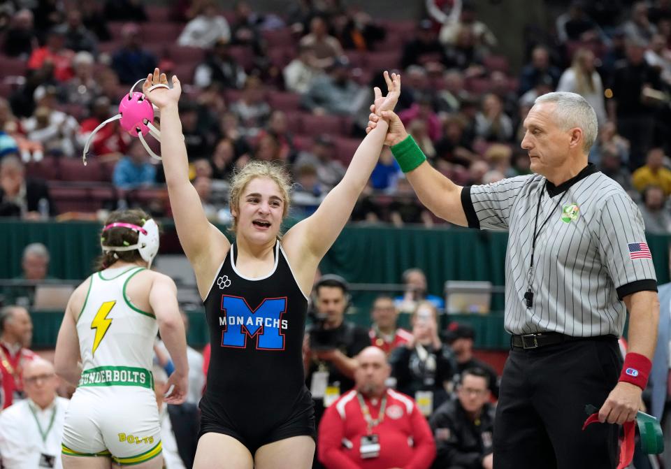 Marysville's Cali Leng improved on last year's runner-up finish by winning the 120-pound title in the first OHSAA girls wrestling state tournament.