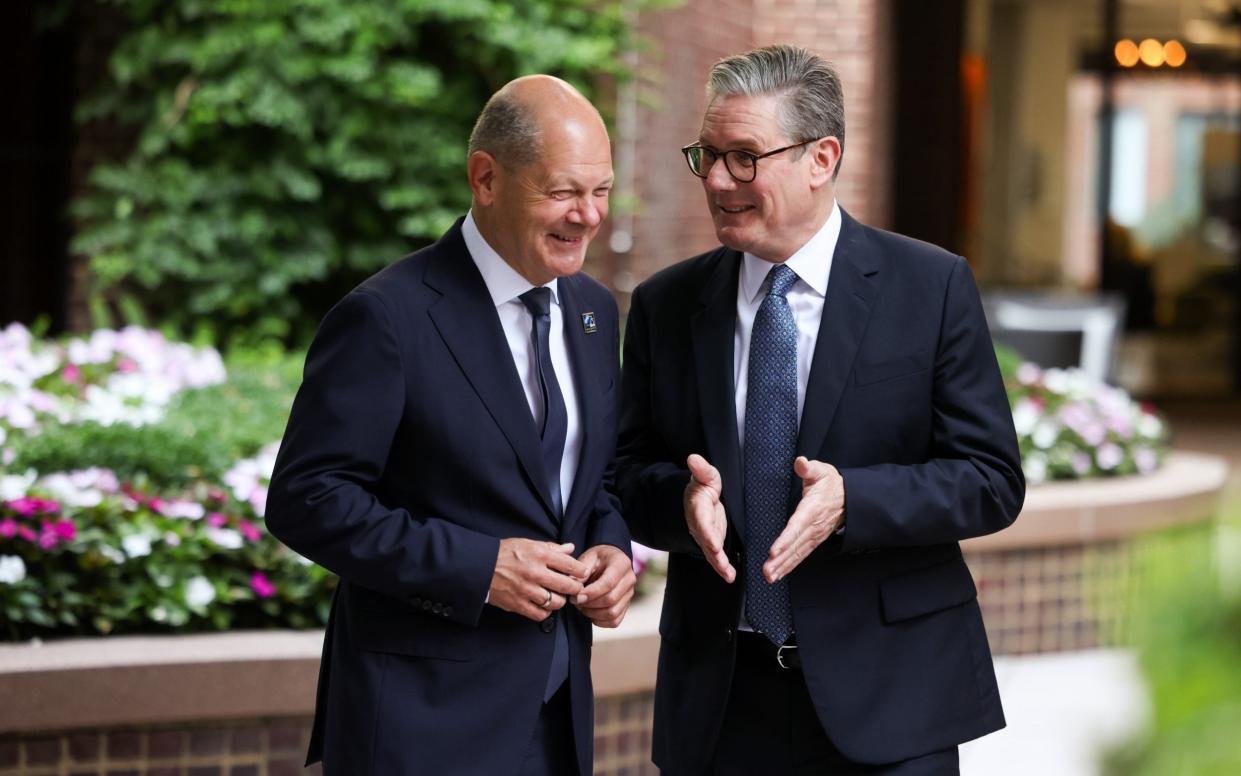 Sir Keir Starmer meets with Olaf Scholz, the German chancellor, as they attend a Nato summit in Washington DC