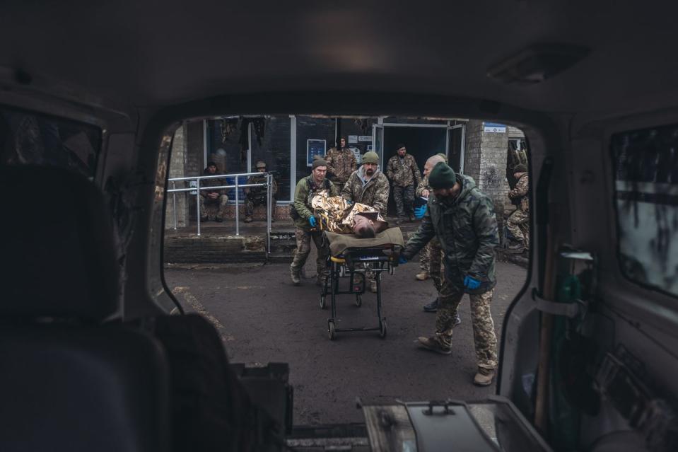 Ukrainian army medics transfer a wounded Ukrainian soldier to a hospital in eastern Ukraine on Dec. 27, 2022. (Diego Herrera Carcedo/Anadolu Agency via Getty Images)