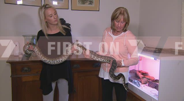 Sharon Pelvko and daughter Laura with the offending pet snake, Scoot. Photo: 7News