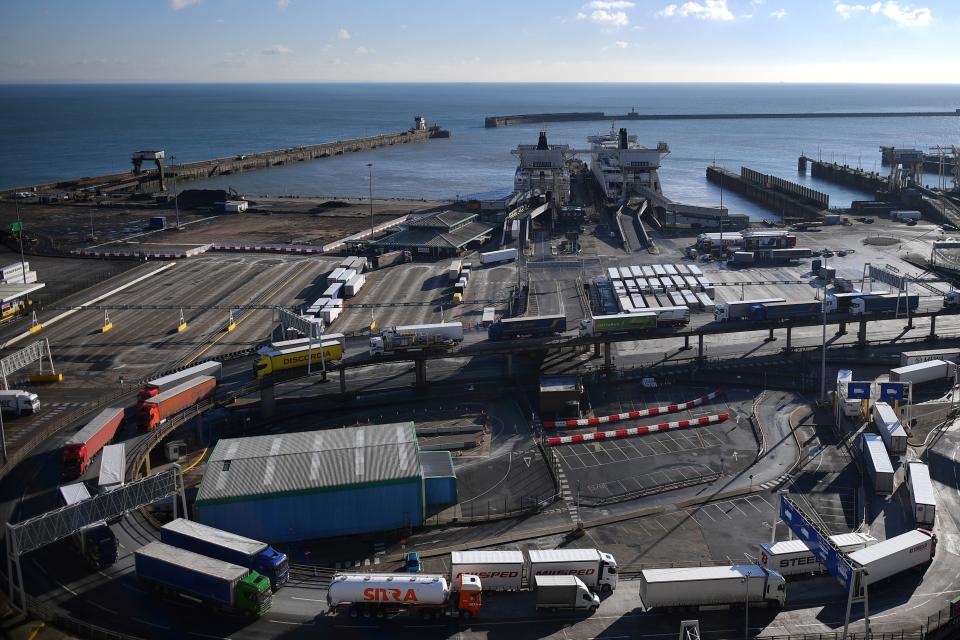 Freight trucks and HGVs disembark a DFDS ferry after arriving at the Port of Dover on the south coast of England on January 25, 2021. - EU foreign policy chief Josep Borrell on Monday slammed Britain's refusal to grant the bloc's envoy full diplomatic status and warned it dented prospects for post-Brexit cooperation. (Photo by BEN STANSALL / AFP) (Photo by BEN STANSALL/AFP via Getty Images)