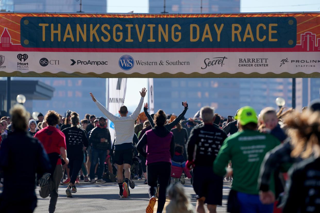The Western & Southern Thanksgiving Day Race takes place Thursday. Pictured: Race participants cross the finish line in 2022.