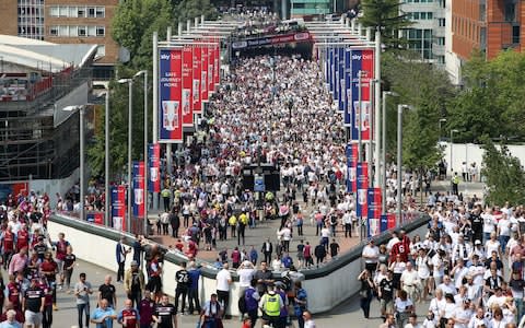Fans stream down Olympic Way
