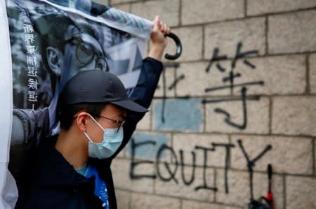 Supporters of jailed activist Edward Leung, gather outside the High Court as Leung appeals against his conviction and sentence, in Hong Kong