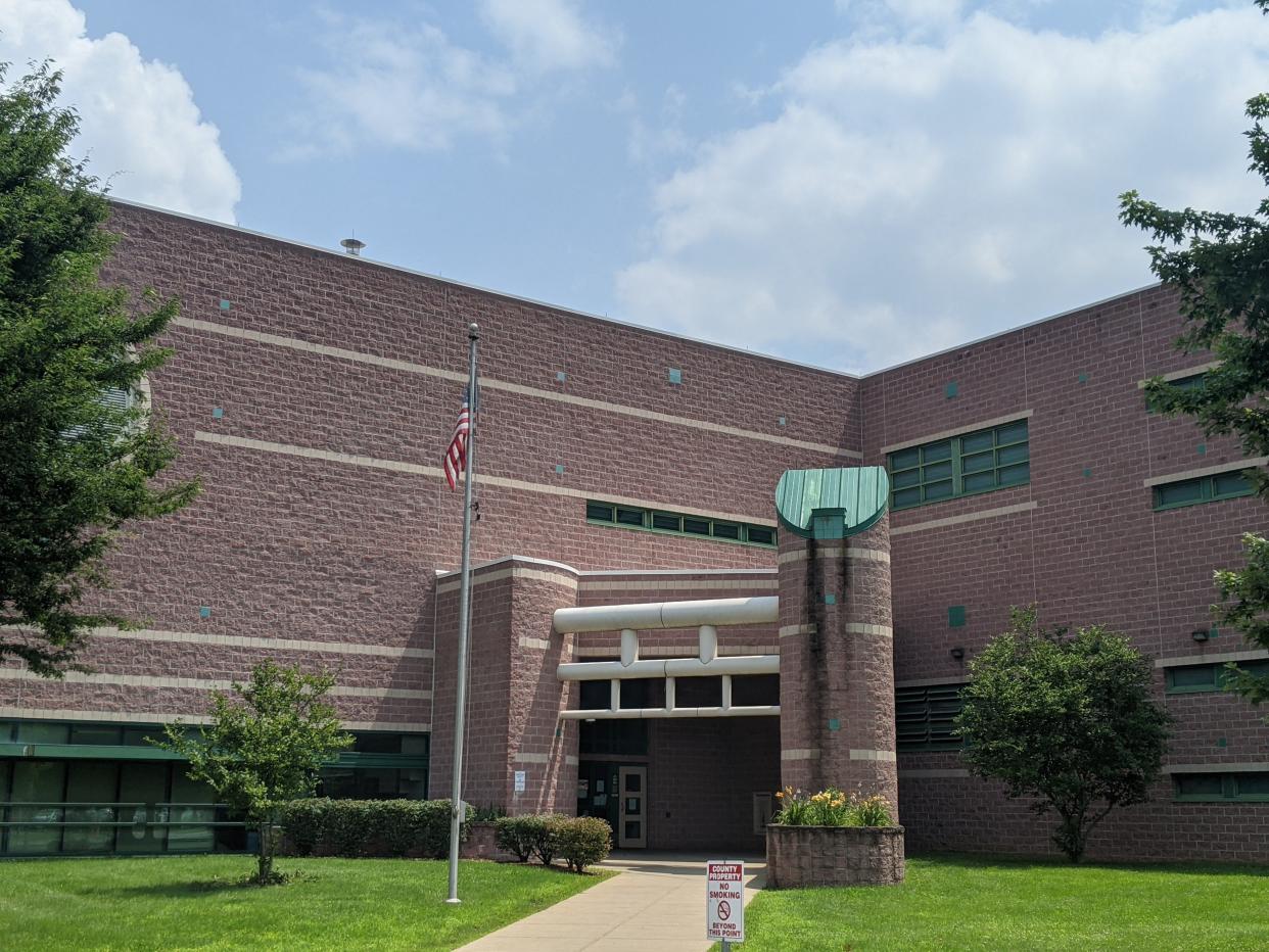 Lawrence County commissioners approved settlement and release agreements with jail Warden Brian Covert and Deputy Warden Jason Hilton.