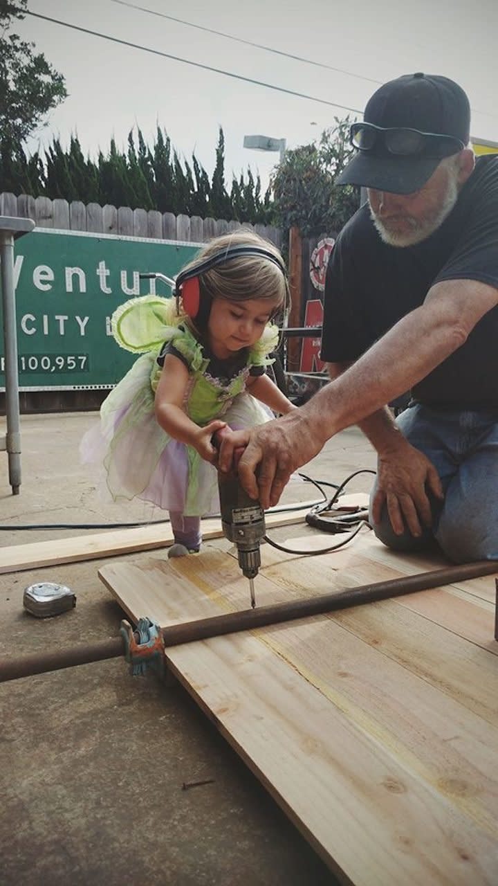 "My 2-year-old likes to build things with her Papa."