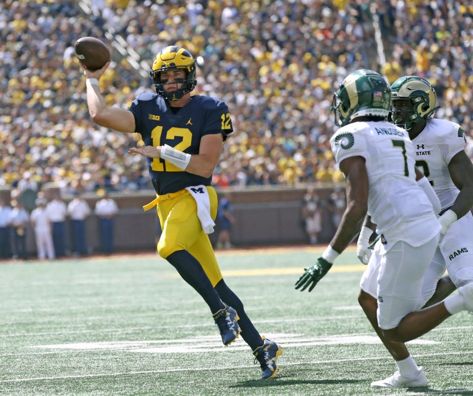 Michigan quarterback Cade McNamara looks to pass against Colorado State during the first half on Saturday, Sept. 3 , 2022, in Ann Arbor.