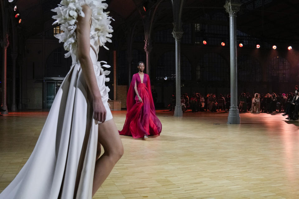 A model wears a creation for the Elie Saab Spring-Summer 2022 Haute Couture fashion collection, in Paris, Wednesday, Jan. 26, 2022. (AP Photo/Francois Mori)