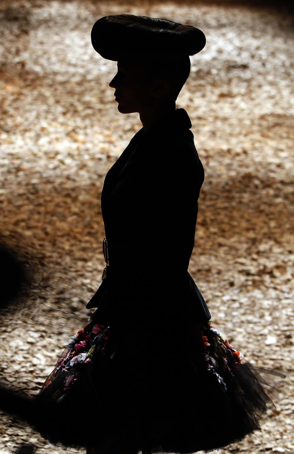 A models displays a creation by designer McQ Alexander McQueen during a fashion show at London Fashion Week, Monday, Feb. 20, 2012. (AP Photo/Kirsty Wigglesworth)