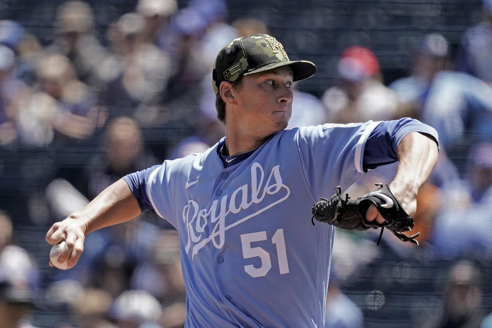 Kansas City Royals starting pitcher Brady Singer throws during the first inning of a baseball game against the Minnesota Twins Sunday, May 22, 2022, in Kansas City, Mo. (AP Photo/Charlie Riedel)