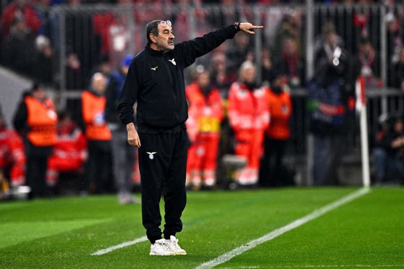 Lazio coach Maurizio Sarri gives tactical instructions to his players from the touchline during the UEFA Champions League round of 16 second leg soccer match between FC Bayern Munich and S.S. Lazio at Allianz Arena. Tom Weller/dpa