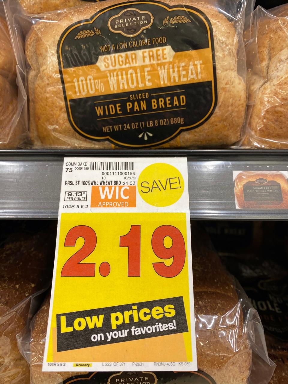 The WIC-eligible logo is shown on the pricing sign for a loaf of whole wheat bread.