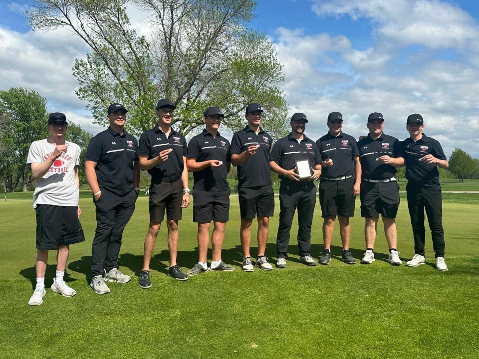 The ADM boys golf team poses for a photo after winning the Raccoon River Conference tournament on Monday, May 6, 2024, at Ballard Golf & Country Club.