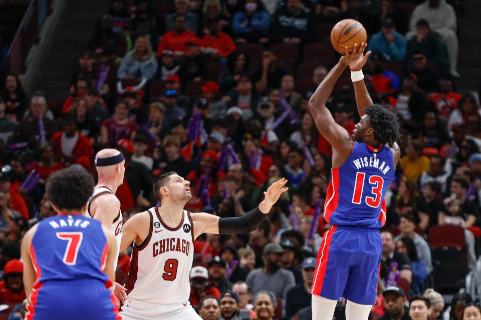 Detroit Pistons center James Wiseman shoots over Chicago Bulls center Nikola Vucevic during the first half at United Center, April 9, 2023.