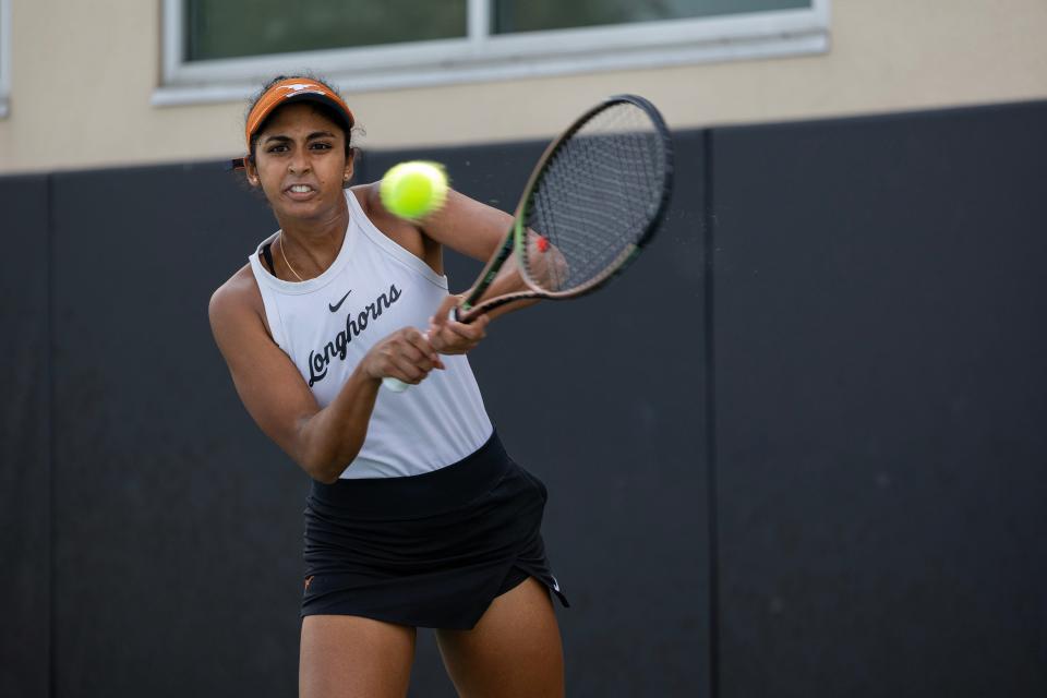 Texas tennis player Malaika Rapolu, a senior from Cedar Park, won her opening match in the women's singles bracket at the NCAA singles championships on Monday at the Greenwood Tennis Center in Stillwater, Okla.