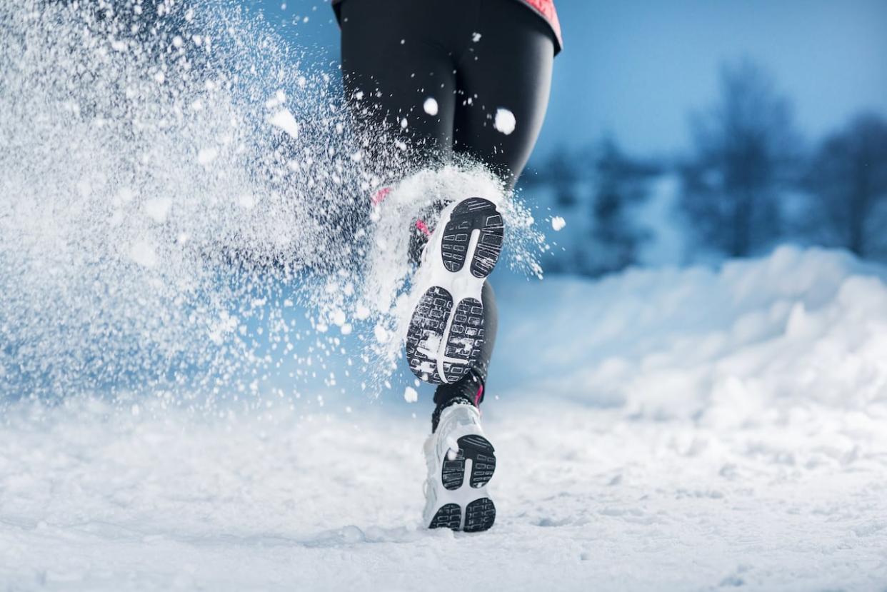 Winter runners say you can still run in freezing temperatures, but you might want to invest in the right kind of shoes.  (Ground Picture/Shutterstock - image credit)