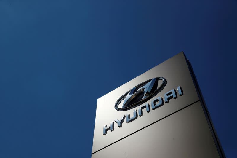 FILE PHOTO: A shop sign of Hyundai is seen outside a car showroom in Bletchley, Milton Keynes, Britain