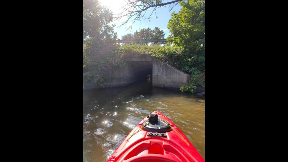 Kayaker Wyatt Maxey approaches the tunnel-like culvert beneath Interstate 77 that connects Lake Cornelius with Lake Norman. WYATT MAXEY/WYATT MAXEY