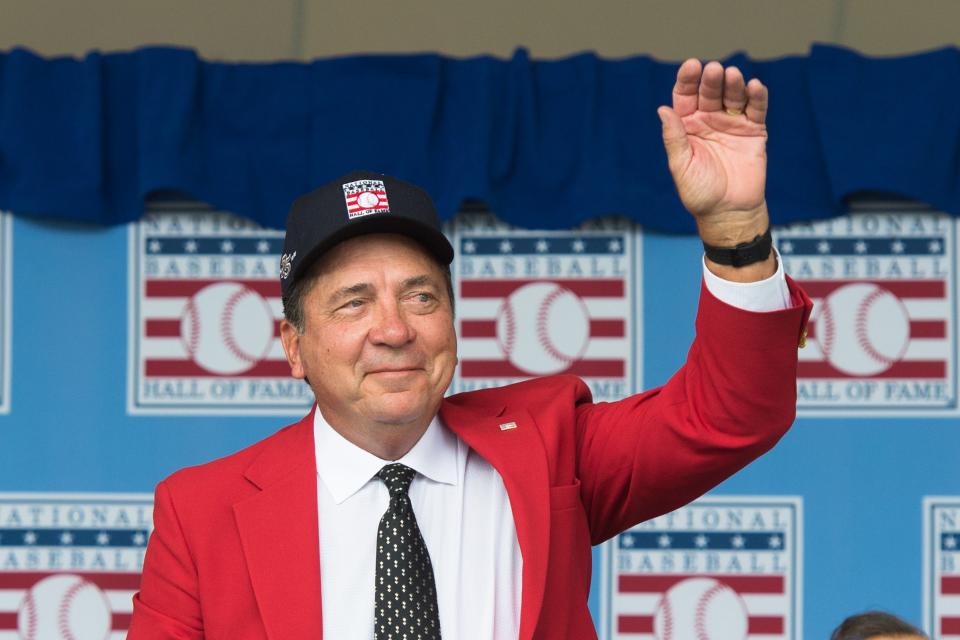 Jul 27, 2014; Cooperstown, NY, USA; Hall of Fame player Johnny Bench responds to being introduced during the class of 2014 national baseball Hall of Fame induction ceremony at National Baseball Hall of Fame. Mandatory Credit: Gregory J. Fisher-USA TODAY Sports