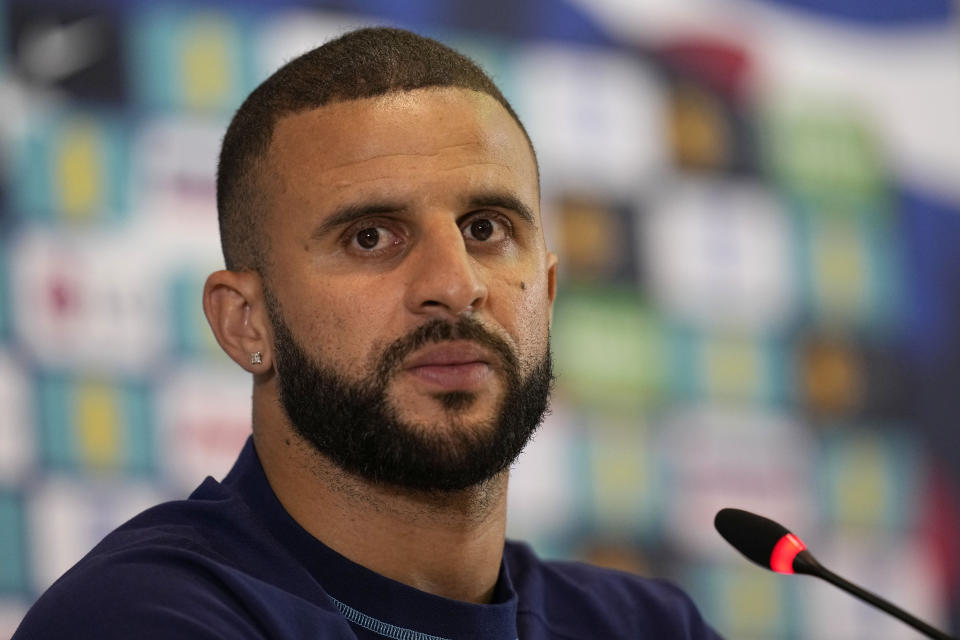 England's Kyle Walker speaks to the media during a press conference at Al Wakrah Sports Complex, in Al Wakrah, Qatar, Wednesday, Dec. 7, 2022. (AP Photo/Abbie Parr)