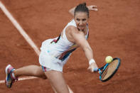 Karolina Pliskova of the Czech Republic plays a shot against France's Leolla Jeanjean during their second round match at the French Open tennis tournament in Roland Garros stadium in Paris, France, Thursday, May 26, 2022. (AP Photo/Thibault Camus)