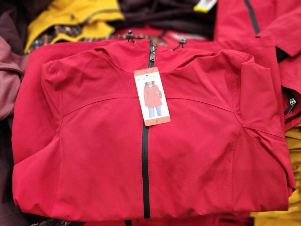 A red Pendleton jacket, folded.