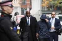 Former undercover reporter for the News of the World and the Sun on Sunday, Mazher Mahmood (C), arrives for sentencing at the Old Bailey in London, Britain October 21, 2016. REUTERS/Stefan Wermuth