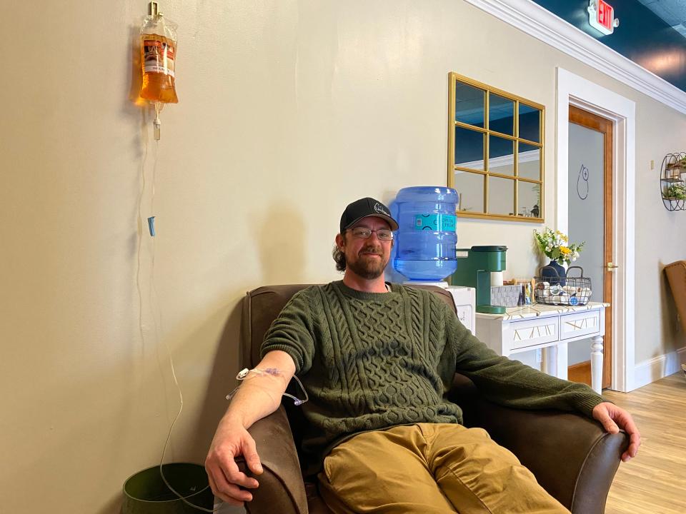 Matthew Iafrate, Hydration Specialist employed at Live Well IV Hydration Lounge, showing what getting IV hydration therapy looks like.