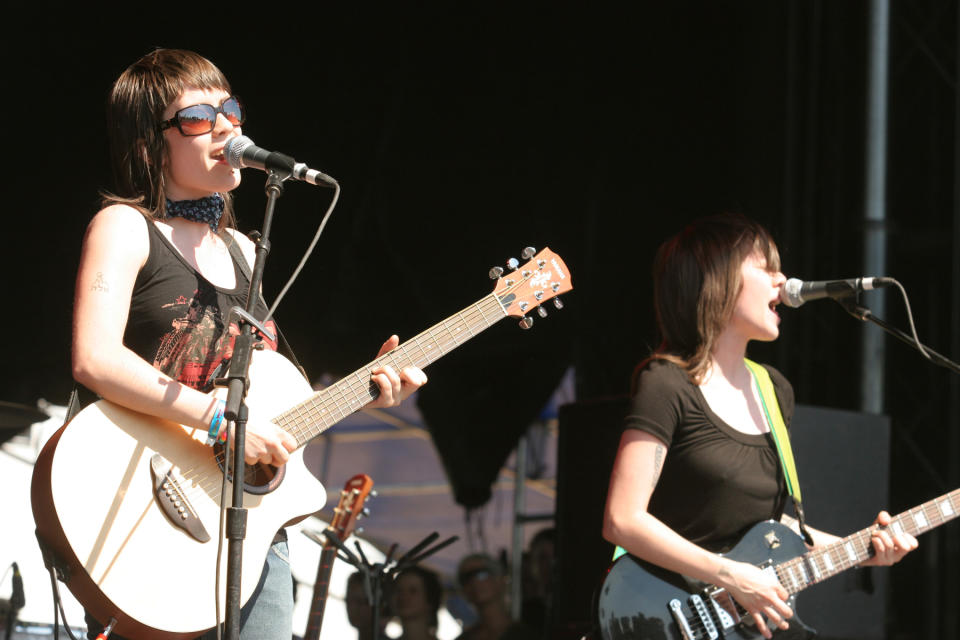 Tegan (left) and Sara perform live at Lollapalooza 2005 in Chicago. - Credit: Matt Carmichael/Getty Images