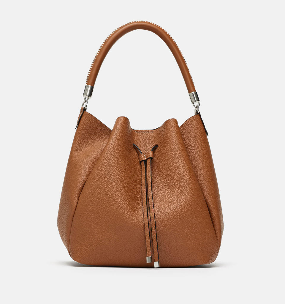 Zara Bucket Bag With Topstitched Handle. (Photo: Zara)