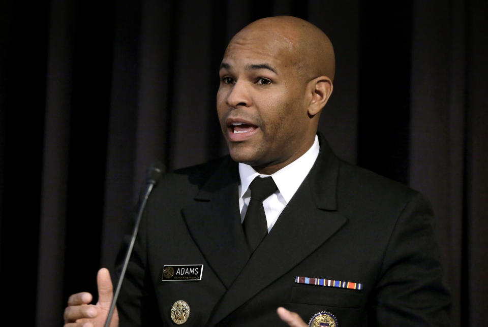 FILE - In this Dec. 6, 2018, file photo, United States Surgeon General Jerome Adams addresses an audience during a national summit focused on police efforts to address the opioid epidemic at Harvard Medical School in Boston. The U.S. surgeon general says swift action is needed to prevent millions of teenagers and adolescents from becoming hooked on Juul and other high-nicotine electronic cigarettes. Adams said Tuesday, Dec. 18, that parents, teachers and physicians must take aggressive steps to address an epidemic of underage vaping. (AP Photo/Steven Senne, File)