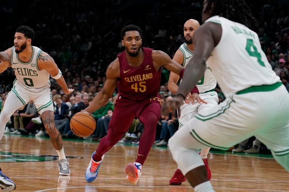 Cleveland Cavaliers guard Donovan Mitchell (45) drives to the basket during an NBA basketball game, Tuesday, Dec. 12, 2023, in Boston. (AP Photo/Charles Krupa)