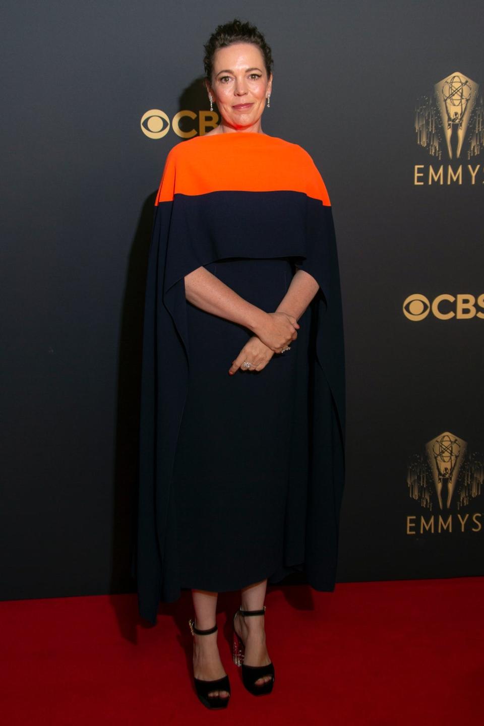 Olivia Colman looked regal in a navy and orange gown to celebrate the Emmys (Joel C Ryan/Invision/AP) (AP)