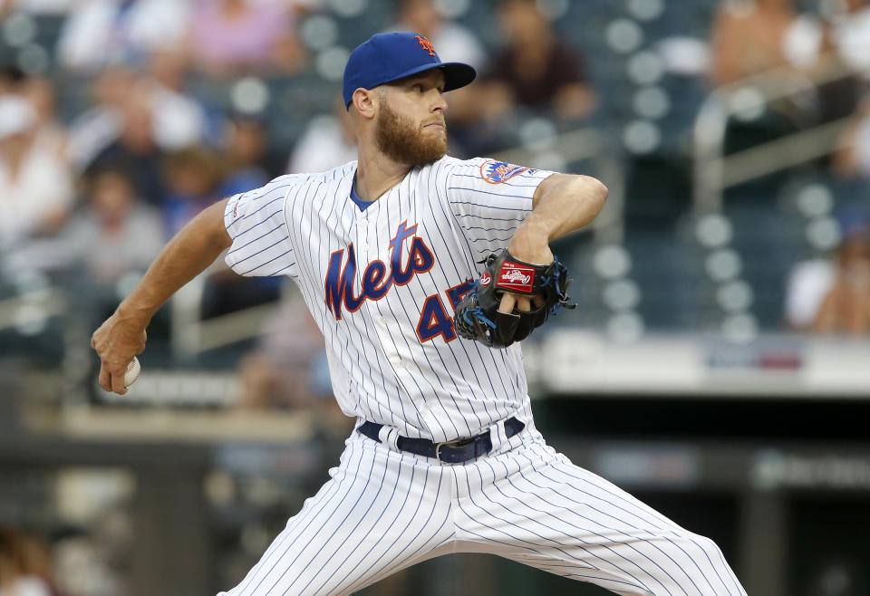 NEW YORK, NEW YORK - JULY 26:   Zack Wheeler #45 of the New York Mets pitches during the first inning against the Pittsburgh Pirates at Citi Field on July 26, 2019 in New York City. (Photo by Jim McIsaac/Getty Images)