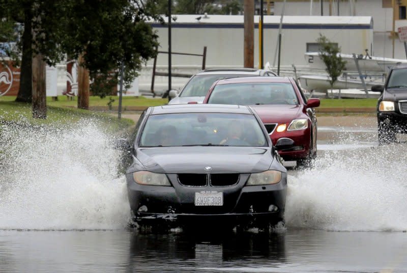 Cars traverse a low spot in the road in the West End section of New Orleans as Hurricane Laura, a major Category 4 storm, skirts the coast of Louisiana on August 26, 2020. The state is using Bipartisan Infrastructure Law funds for disaster mitigation. File Photo by AJ Sisco/UPI