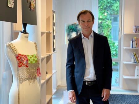 FILE PHOTO: H&M Chief Executive Karl-Johan Persson poses for a picture at the fashion retailer's headquarters in Stockholm