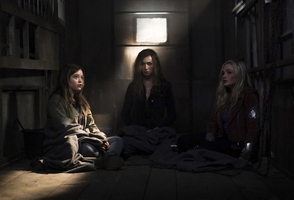 This image released by ABC shows Jade Pettyjohn, from left, Jesse James Keitel and Natalie Alyn Lind in a scene from "Big Sky." Native American tribes and coalitions are condemning “Big Sky,” a Montana-set ABC drama, for ignoring the history of violence inflicted on Indigenous women and instead making whites the crime victims. (Darko Sikman/ABC via AP)