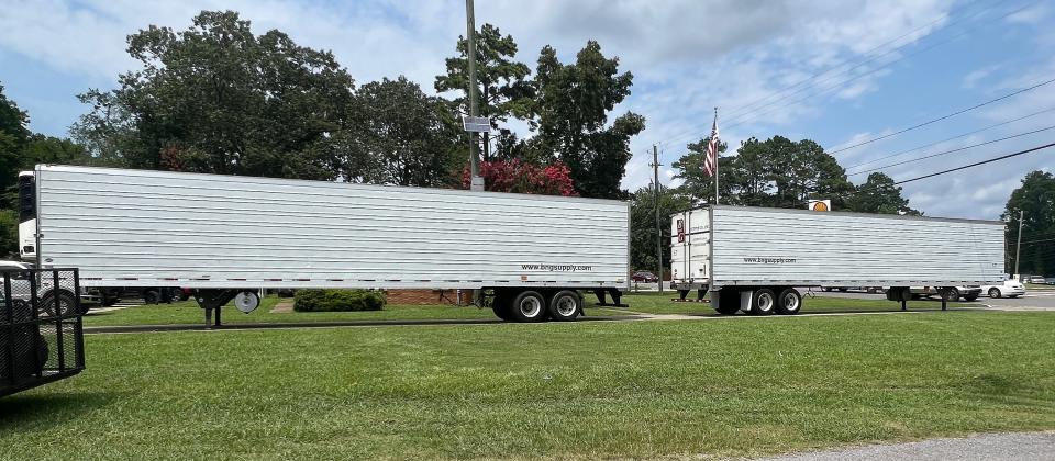 A freezer truck and a refrigerated truck were set up Saturday at Gadsden's Fire Station No. 5 for residents affected by Thursday's storm to store food.