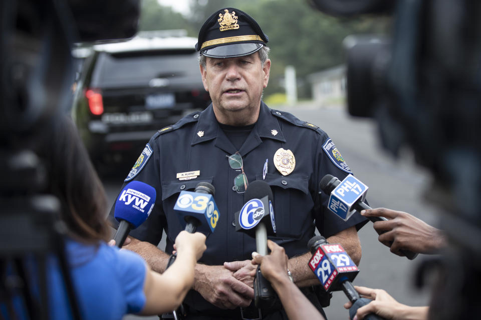 Upper Moreland Police Chief Michael Murphy speaks with members of the media about a small plane crash sets in a residential neighborhood in Upper Moreland, Pa., Thursday, Aug. 8, 2019. Murphy says the plane hit several trees before it finally came to rest. He said everyone aboard the plane was killed. (AP Photo/Matt Rourke)