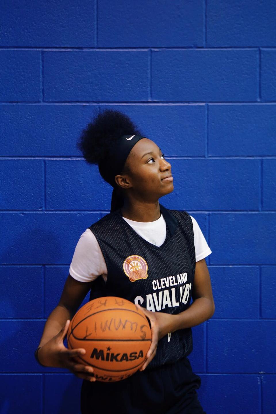 Monikah Jordan, 14, who goes to Kenmore-Garfield, poses for a photo at Summit Lake Community Center.