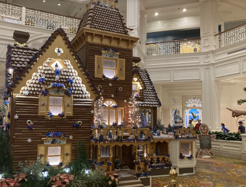 The Grand Floridian gingerbread house is a sight to behold. Completely edible and with a little shop inside that sells holiday treats, the gingerbread house is made of 1,050 pounds of honey, 140 pints of egg whites, 600 pounds of powdered sugar, 700 pounds of chocolate, 800 pounds of flour, and 35 pounds of spices.