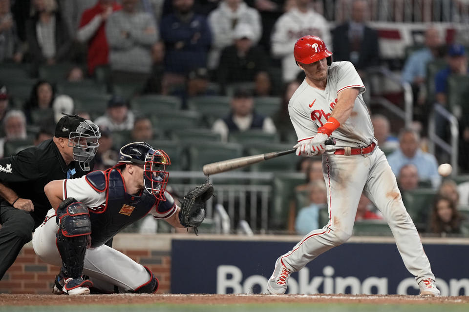 While video replay didn't show an angle in which Sean Murphy made contact with J.T. Realmuto's bat, the Braves' catcher said he believes he did. The Phillies brought in their final run thanks to the call. (AP Photo/Brynn Anderson)